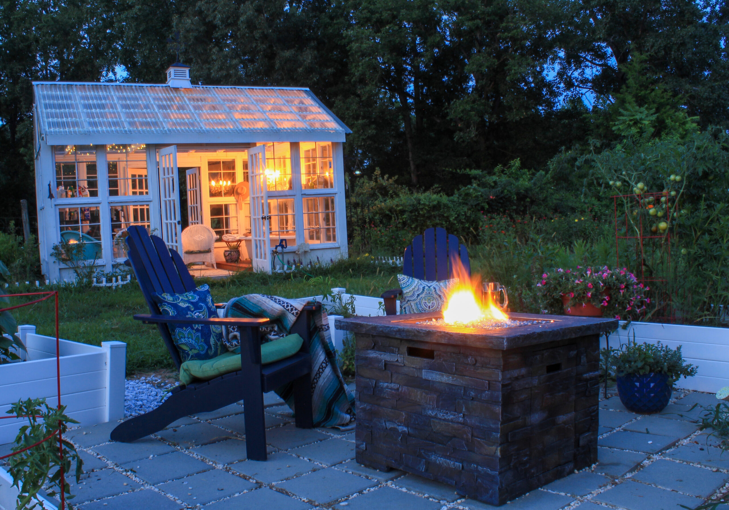 A beautiful outdoor fire pit with sitting area