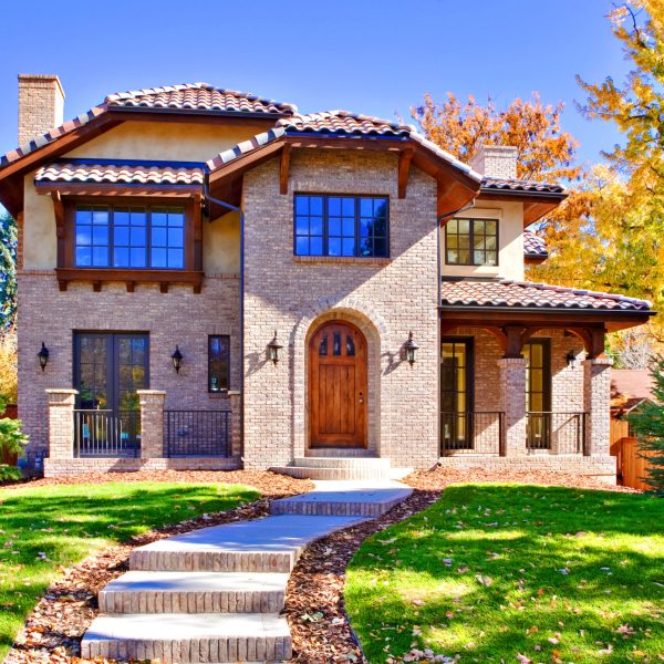 Home Front in All Brick with Green Lawn in Fall Season